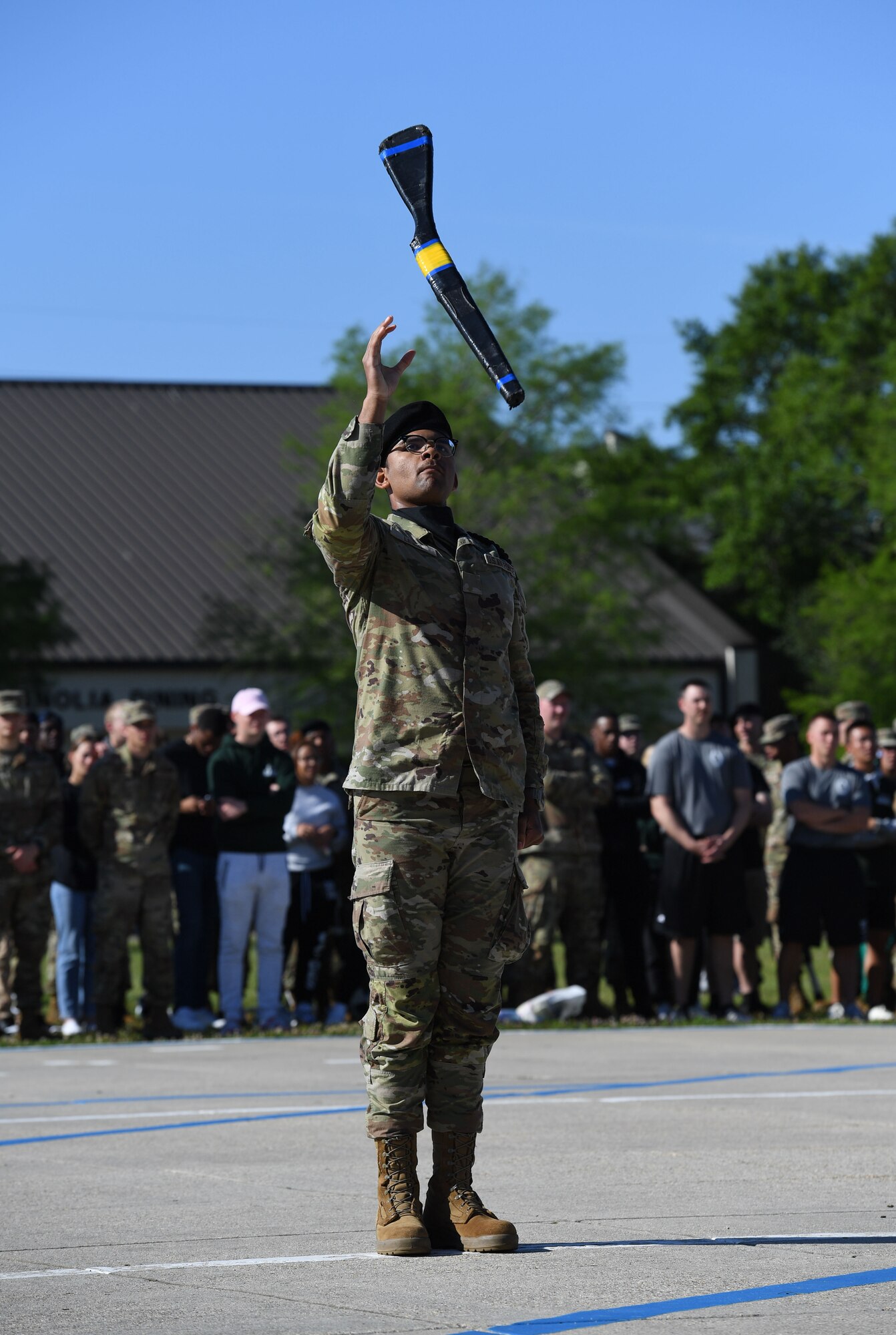 A member of the 335th Training Squadron freestyle drill team performs during the 81st Training Group drill down on the Levitow Training Support Facility drill pad at Keesler Air Force Base, Mississippi, April 14, 2023.