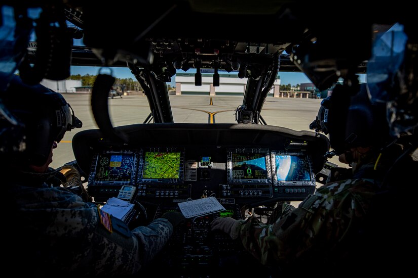 U.S. Army UH-60M Black Hawk helicopter pilots prepare for a training flight at the Army Aviation Support Facility on Joint Base McGuire-Dix-Lakehurst, N.J., March 5, 2020.
