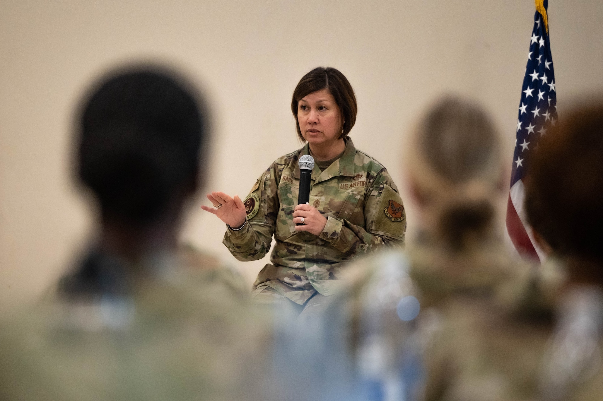 Chief Master Sgt. of the Air Force JoAnne S. Bass speaks into a microphone