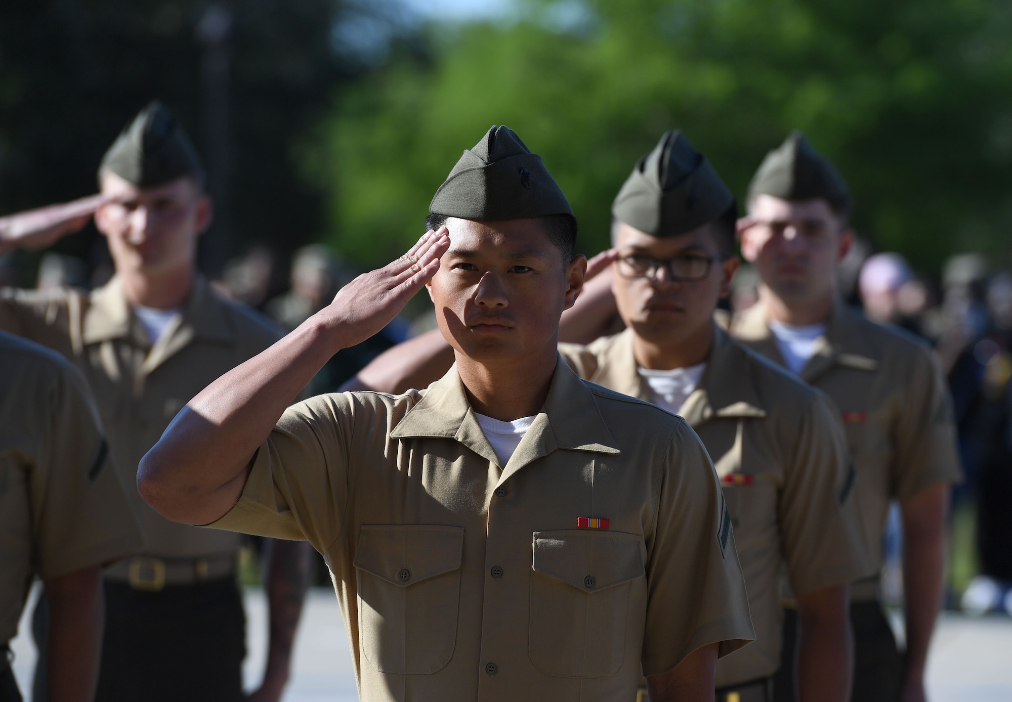 Members of the Keesler Marine Detachment regulation drill team perform during the 81st Training Group drill down on the Levitow Training Support Facility drill pad at Keesler Air Force Base, Mississippi, April 14, 2023.