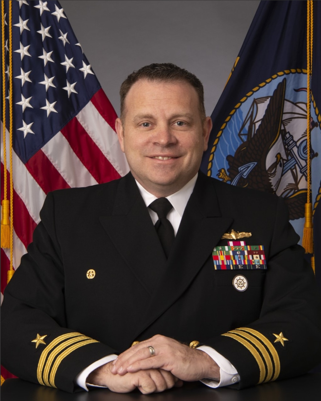 Commander Jayson C. Larsen