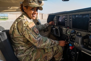 Master Sgt. Careen Lewis, 7th Equipment Maintenance Squadron fabrication flight superintendent, conducts pre-flight checks in a Cessna 182T