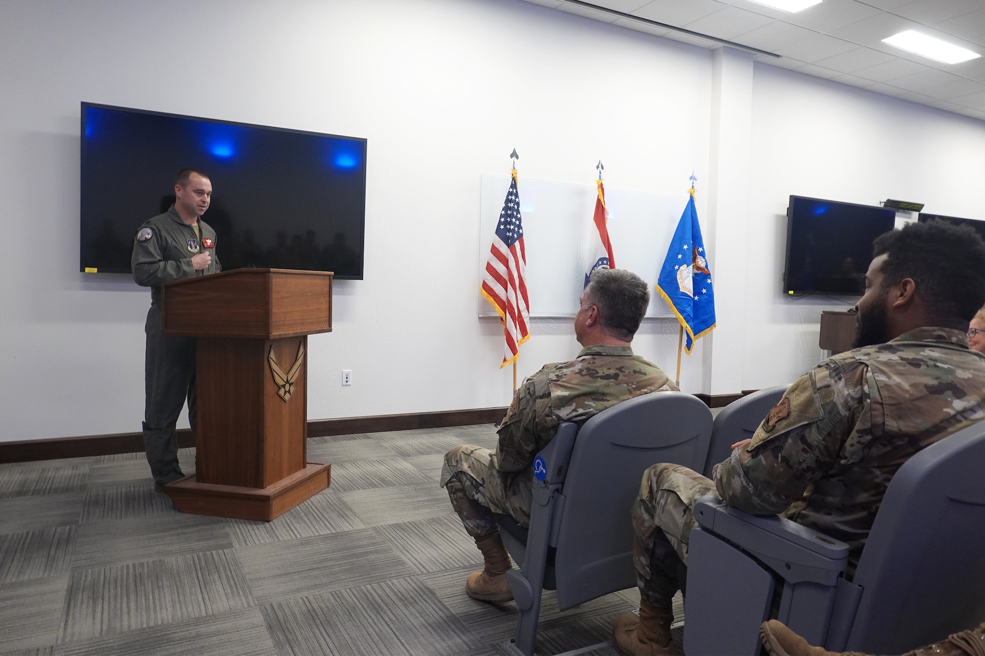 Lt. Col. Matthew Howard, 131st Operations Group commander, delivers remarks during an assumption of command ceremony April 2, 2023, at Whiteman Air Force Base, Missouri. The group's primary operational mission is to provide expeditionary, B-2 Spirit stealth bomber global strike capability and strategic deterrence in support of U.S. national objectives. (U.S. Air National Guard photo by Airman 1st Class Phoenix Lietch)