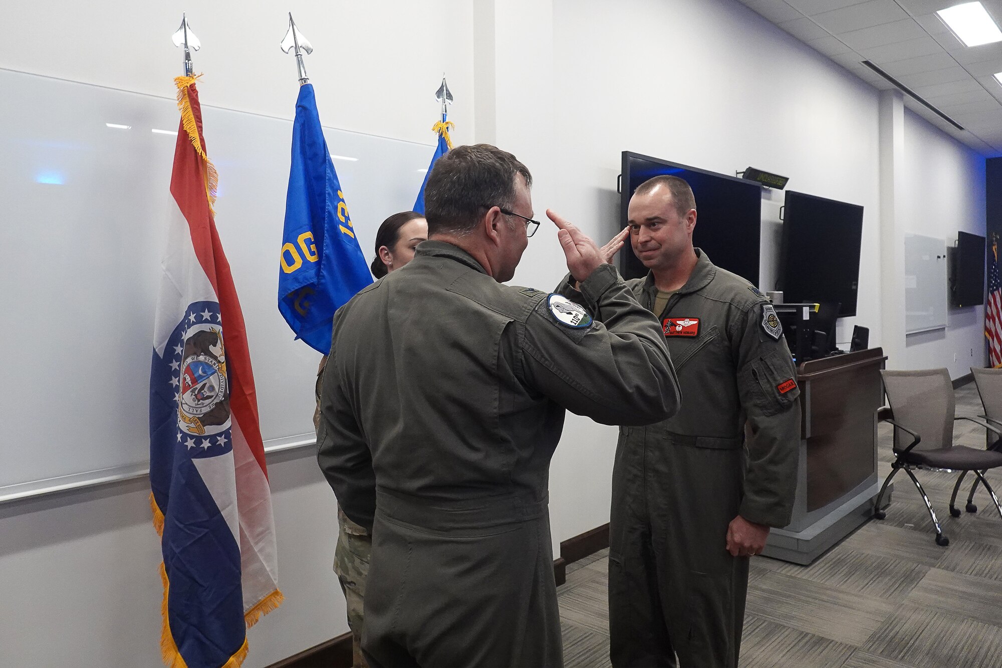 From left, Col. Jared Kennish, 131st Bomb Wing commander, exchanges a salute with Lt. Col. Matthew Howard, incoming 131st Operations Group commander during an assumption of command ceremony April 2, 2023, at Whiteman Air Force Base, Missouri. Howard took command of the group from retired Col. Luke Jayne, who retired in March 2023. (U.S. Air National Guard photo by Airman 1st Class Phoenix Lietch)