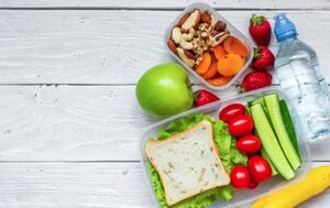 lunch with sandwich, fruites, veggies and nuts