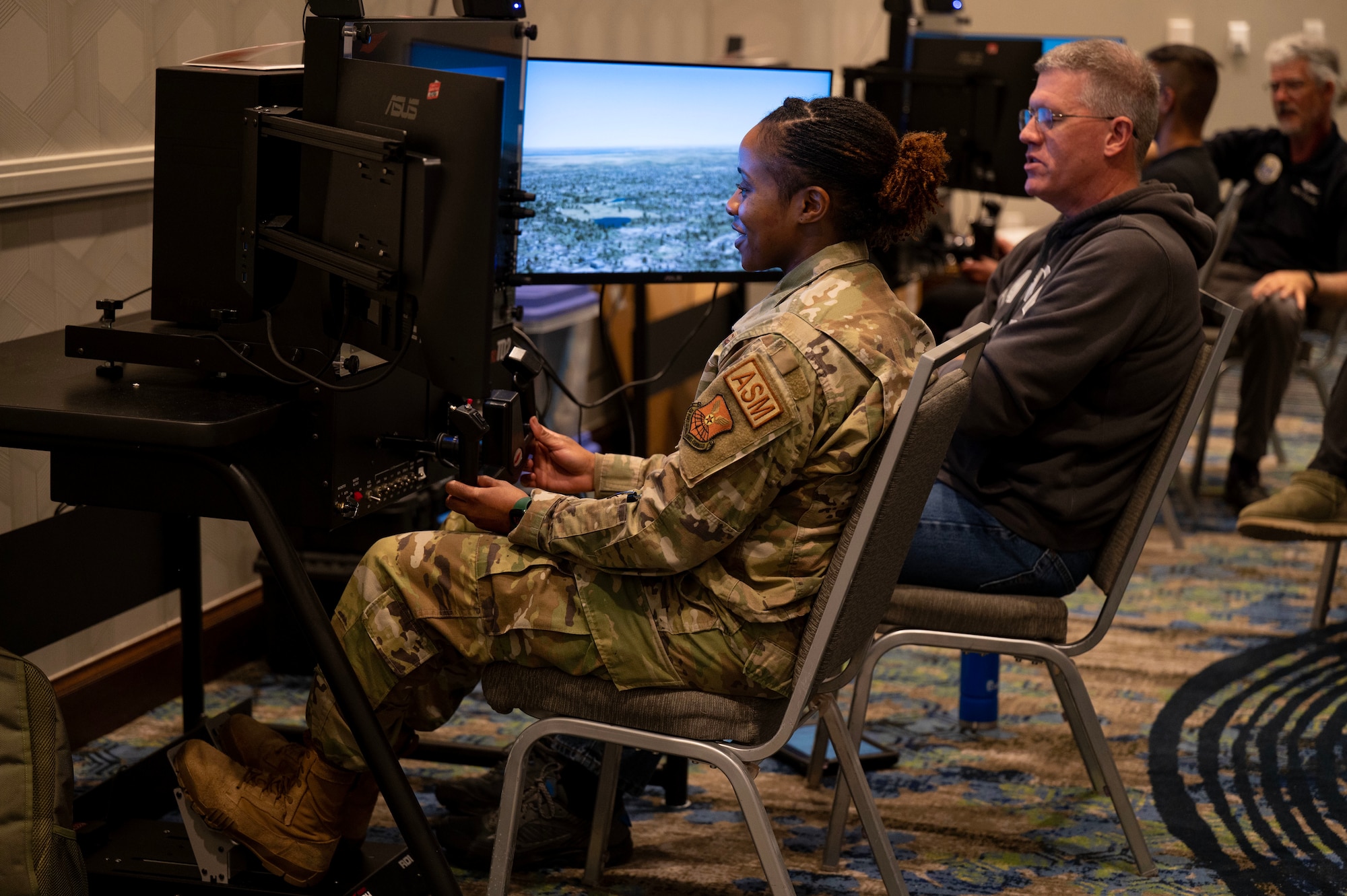 Master Sgt. Careen Lewis, 7th Equipment Maintenance Squadron fabrication flight superintendent, operates a flight simulator