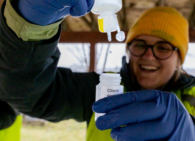 Abby Yancy, a Ph.D. student with the University of Pittsburgh researching nitrogen isotopes, preserves a water sample collected from the Allegheny River in Warren, Pennsylvania, March 31, 2023. As part of a lab project, Yancy and other university students collected water samples to maintain the samples’ integrity before transporting them to university labs. The students coordinated their testing window with the U.S. Army Corps of Engineers Pittsburgh District to collect unique samples gathered during a simulated spring pulse. (U.S. Army Corps of Engineers photo by Andrew Byrne)