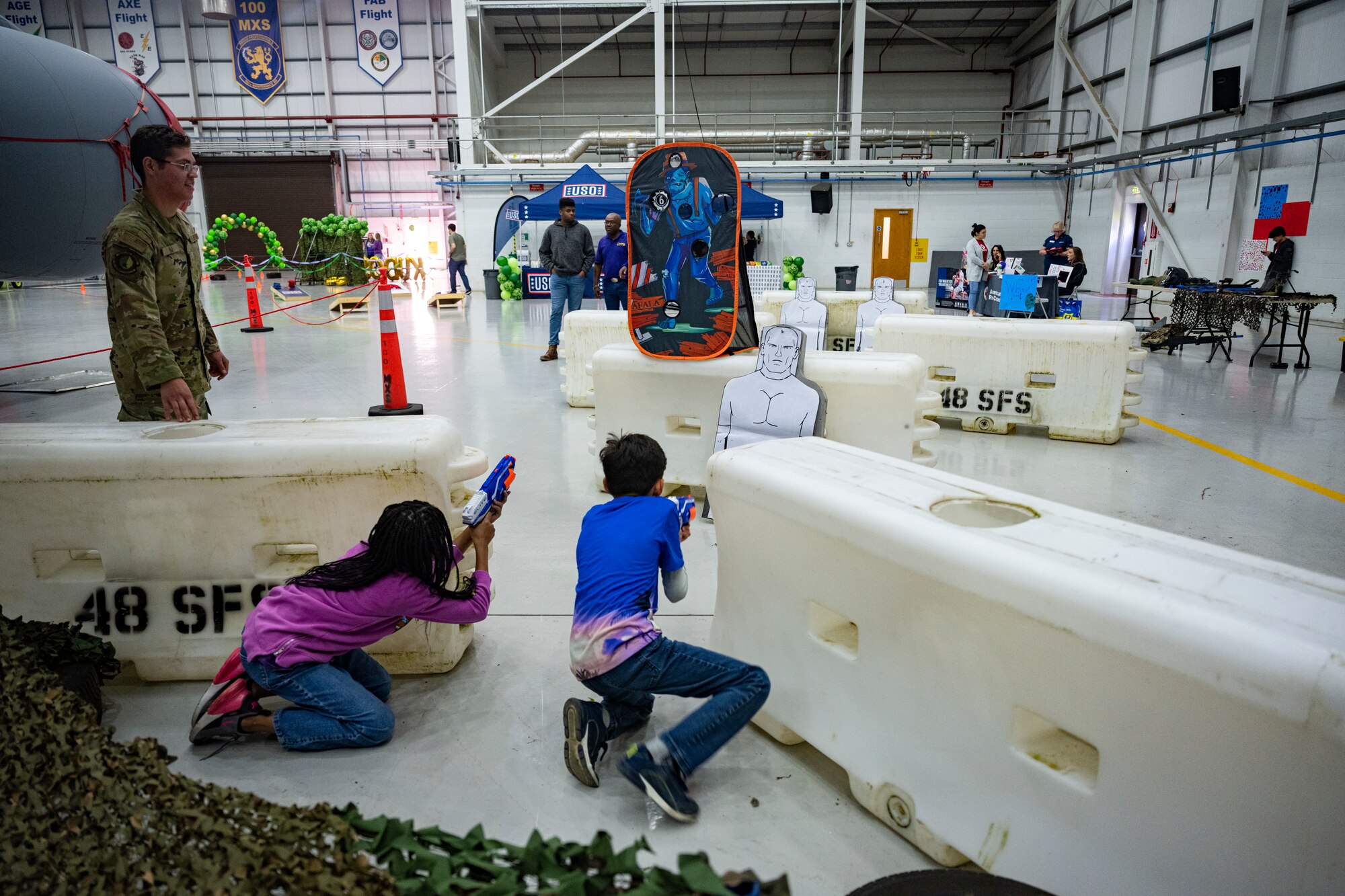 KUDOS is an educational event to help build resilience in military youth by engaging them in activities that simulate the deployment experience.
