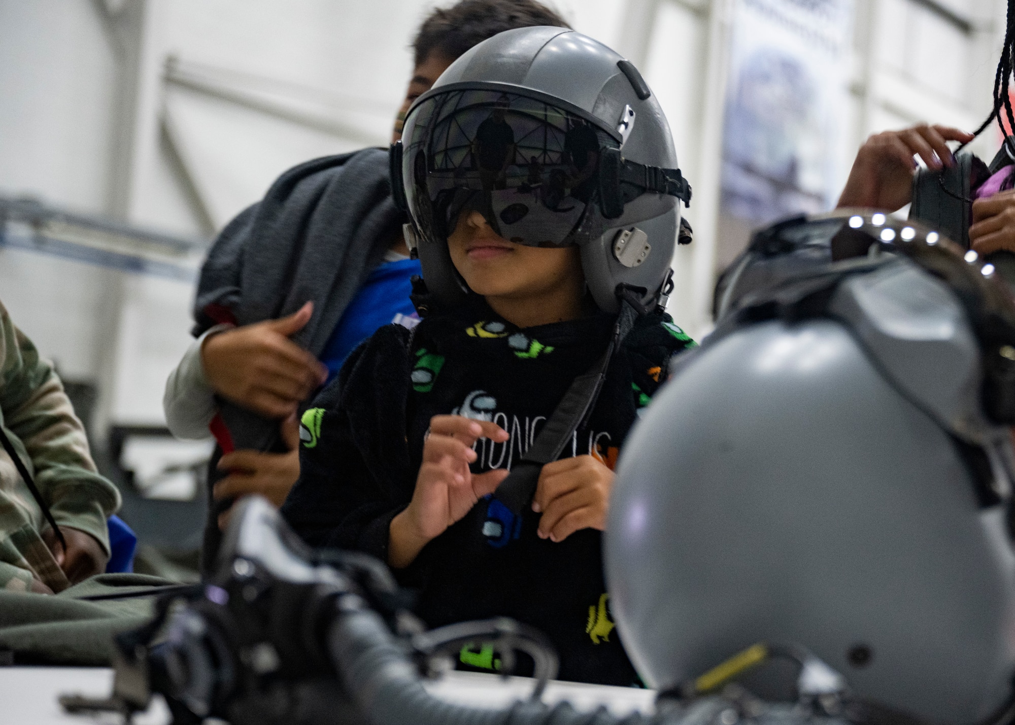 KUDOS is an educational event to help build resilience in military youth by engaging them in activities that simulate the deployment experience.