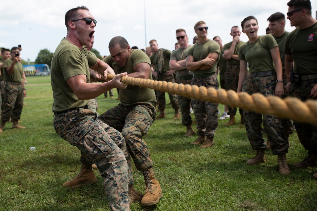 U.S. Marines with Fleet Marine Force, Atlantic, Marine Forces Command, Marine Forces Northern Command, and their respective Headquarters and Service Battalion (HQSVCBN), compete in a tug-o-war competition during a regional field meet at Captain Slade Cutter Park, Virginia, August 5, 2022. Marines, across various units competed head-to-head in pugil sticks, ground fighting, PVC pipe construction, flag football, resupply runs, rowing, kickball, and tug-o-war in order to win the command trophy. FMFLANT, MARFORCOM, MARFOR NORTHCOM holds field meets regularly to sustain camaraderie and healthy work relations.
