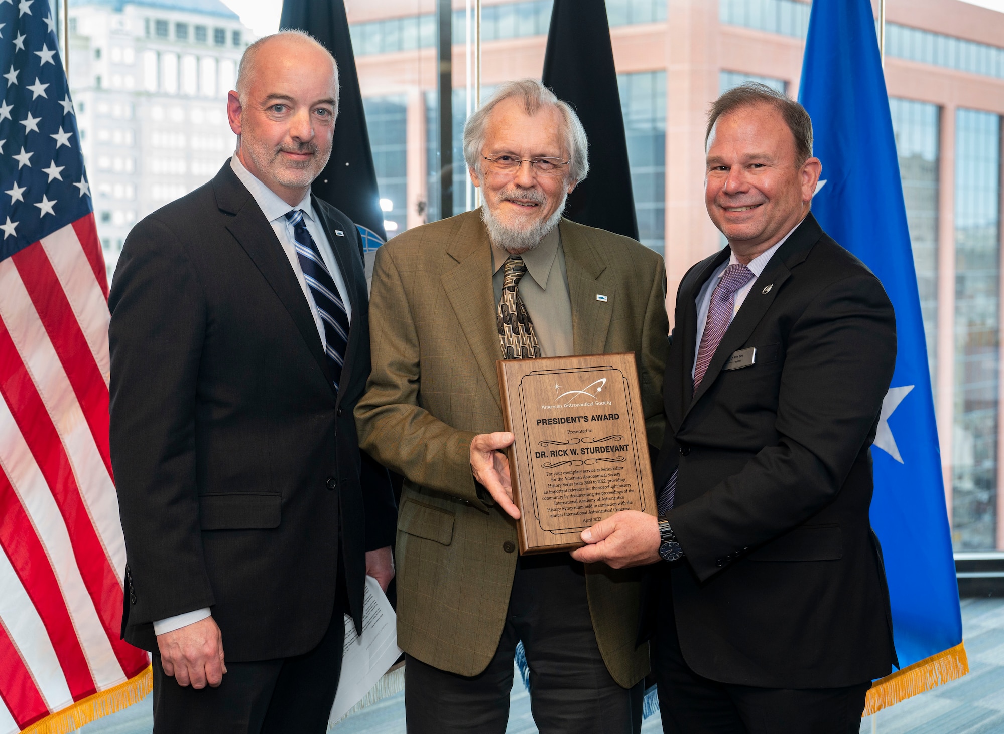 Dr. Rick Sturdevant, Space Training and Readiness Command historian, is presented the American Astronautical Society President's Award for his work as series editor for the International Academy of Astronautics History Series during a ceremony at STARCOM Headquarters