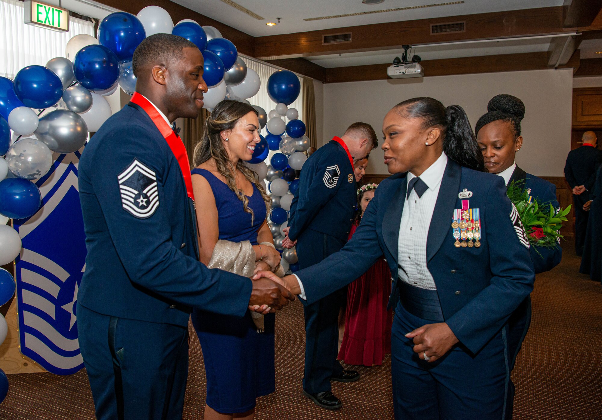Chief Master Sergeant selects and their spouses are congratulated by leadership
