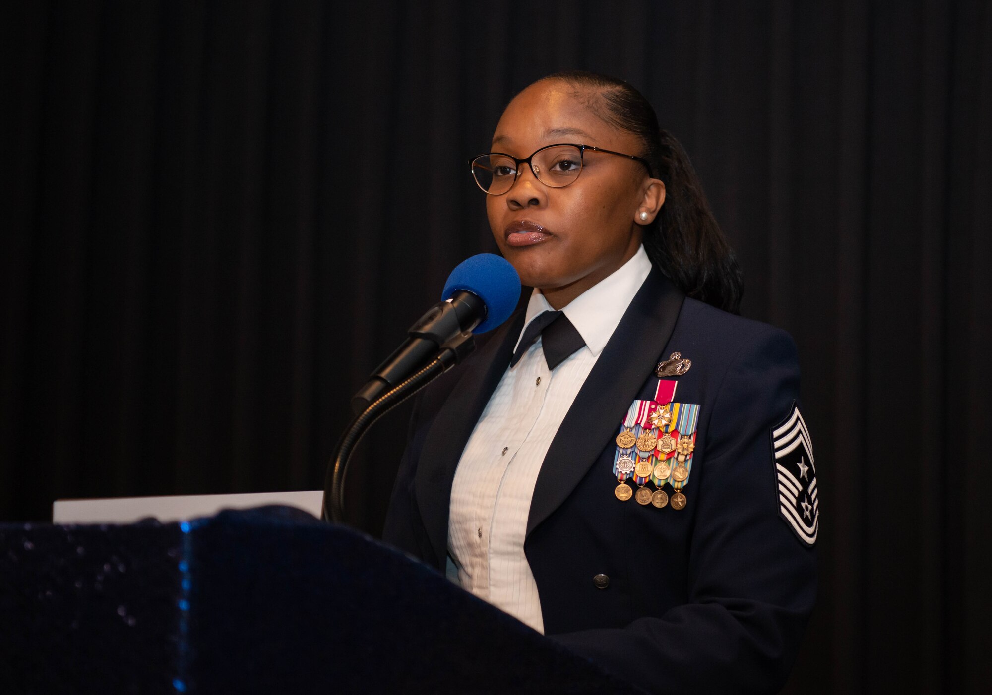 Chief Master Sgt. Charmaine Kelley speaks at a Chief Recognition Ceremony