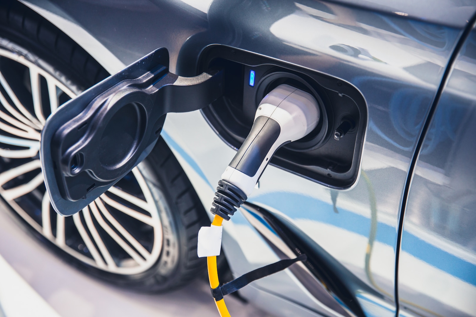 Electric vehicle being charged.