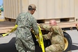 U.S. Army Reseve Staff Sgt. Matthew Zink, aviation quality control, 5th Battalion, 159th Aviation Regiment, 244th Expeditionary Combat Aviation Brigade, and Navy Seaman Lloyd Cuesto, logistics specialist, Naval Supply Systems Command Fleet Logistics Center - Rota, secure aviation equipment on transport vehicles for Defender 23 in Rota, Spain, April 6, 2023.

DEFENDER 23 is a U.S. Army Europe and Africa led exercise focused on the strategic deployment of continental United States-based forces, employment of Army Prepositioned Stocks, and interoperability with Allies and partners. Taking place from 22 April to 23 June, DEFENDER 23 demonstrates USAREUR-AF’s ability to aggregate U.S.-based combat power quickly in Eastern Europe, increase lethality of the NATO Alliance through long-distance fires, build unit readiness in a complex joint, multi-national environment, and leverage host nation capabilities to increase USAREUR-AF’s operational reach.