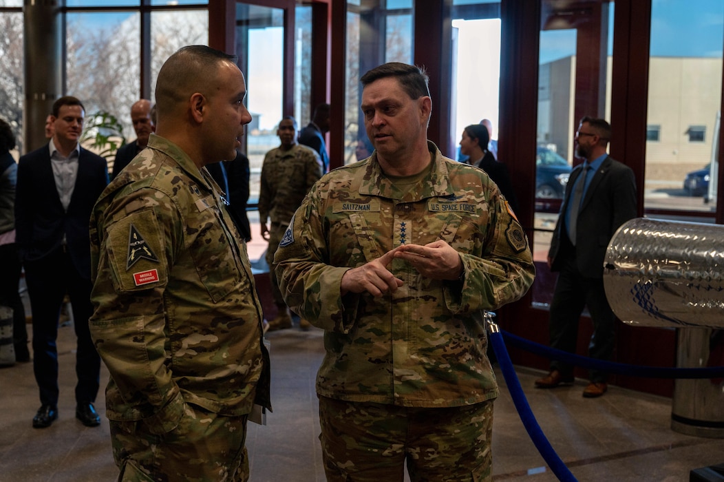 Col. Miguel Cruz, Space Delta 4 commander, speaks to Gen. Chance Saltzman, Chief of Space Operations