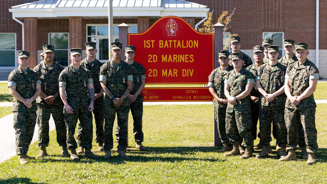U.S. Marines with 1st Battalion, 2d Marine Regiment, 2d Marine Division pose for a photo, after an award ceremony on Camp Lejeune, North Carolina, April 12, 2023. The Super Squad competition tests infantry squads in a variety of combat related skills and determines the most effective squad in the division. (U.S. Marine Corps photo by Cpl. Timothy Fowler)