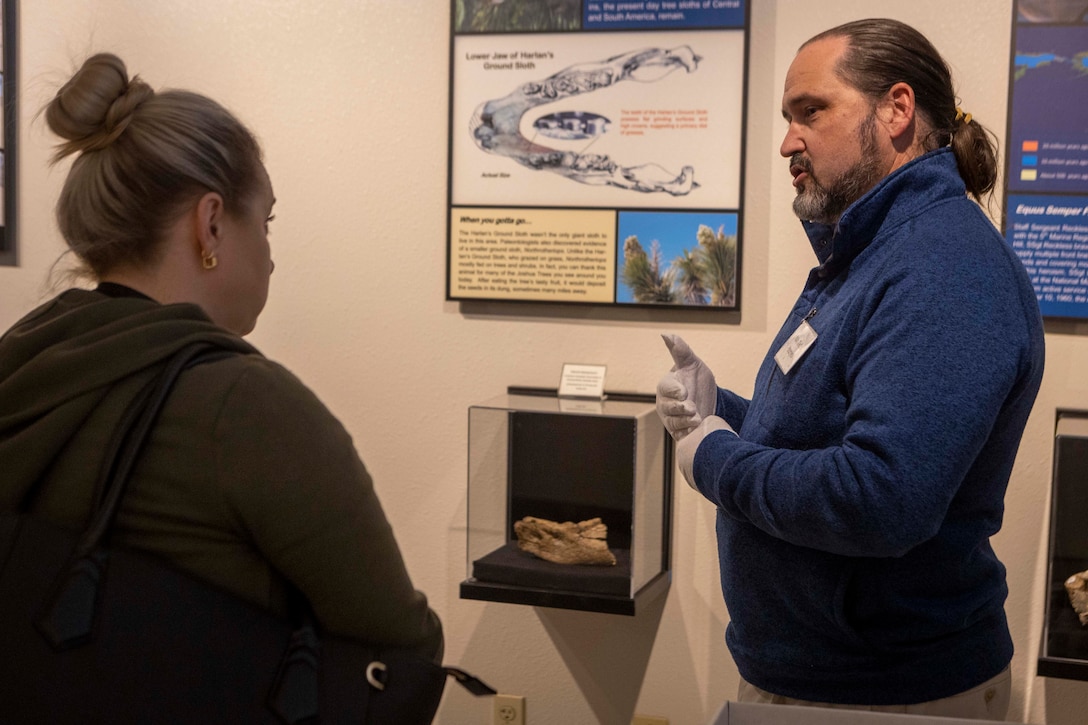 A MCAGCC Archeologist speaks with a Tribal Archivist