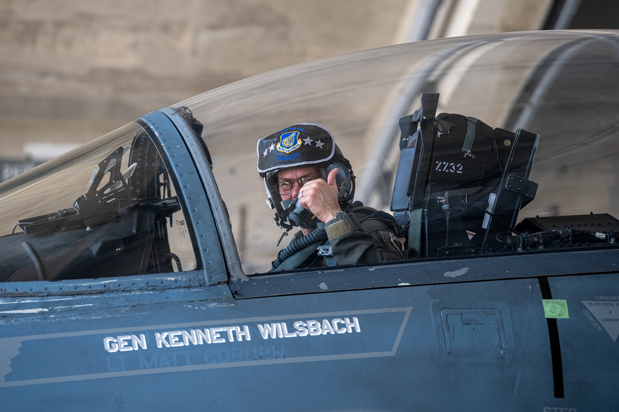 An Airman returns from a flight.