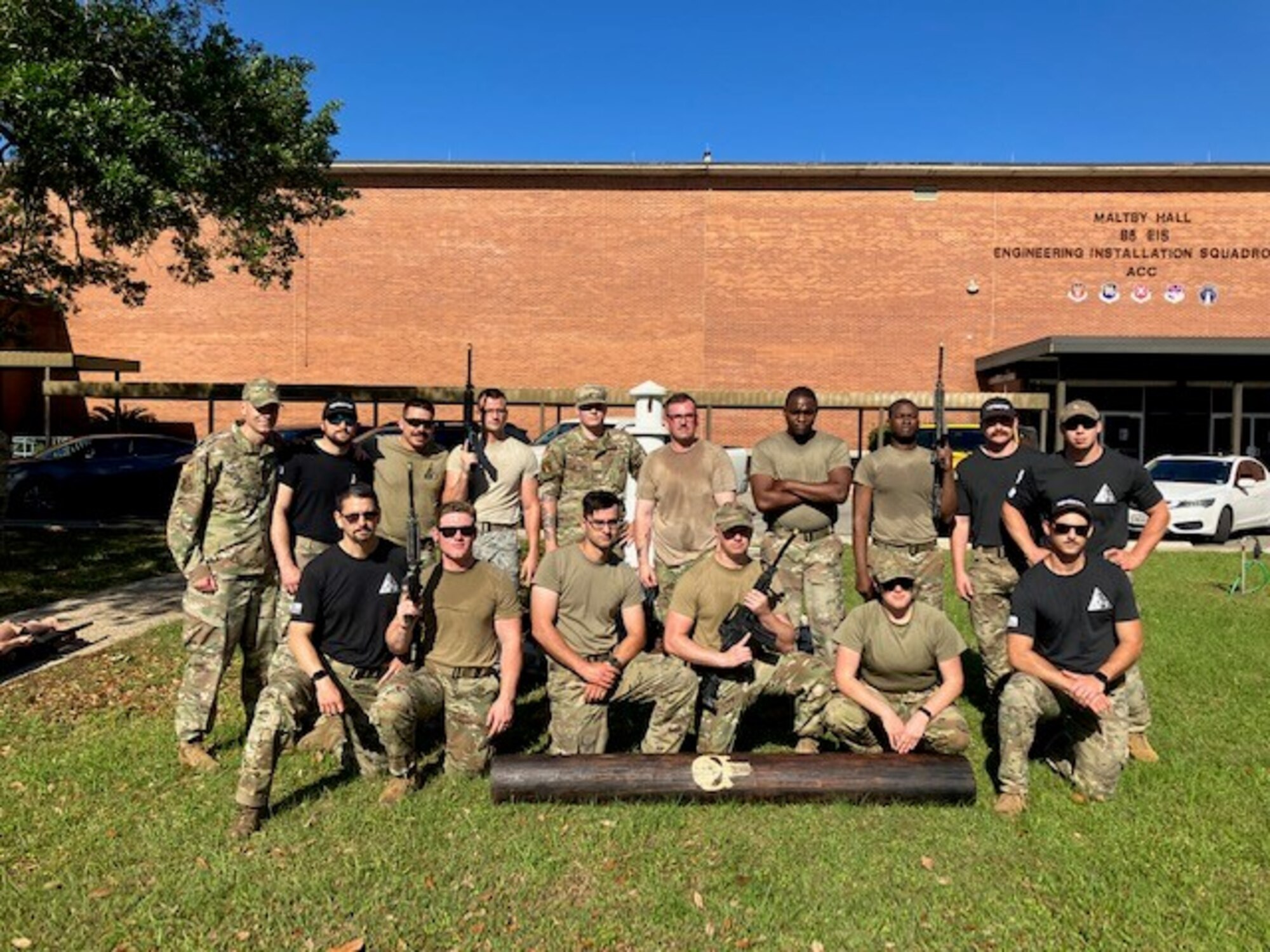 Courtesy photo of members from the 85th Engineering Installation Squadron and the 5th Combat Communications Support Squadron posing for photo in the first combat readiness course at Keesler, on April 14, 2023. In this course 85th EIS students learn weapons familiarization, combatives and other pre-deployment tactics. (Courtesy photo)