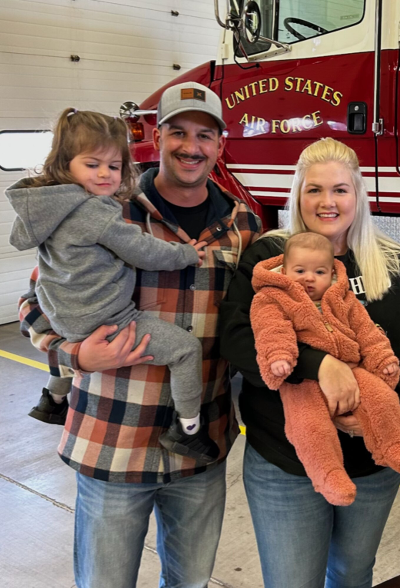 MSgt. Andrew Mistkowski, Sheppard's in-service recruiter, and his family.