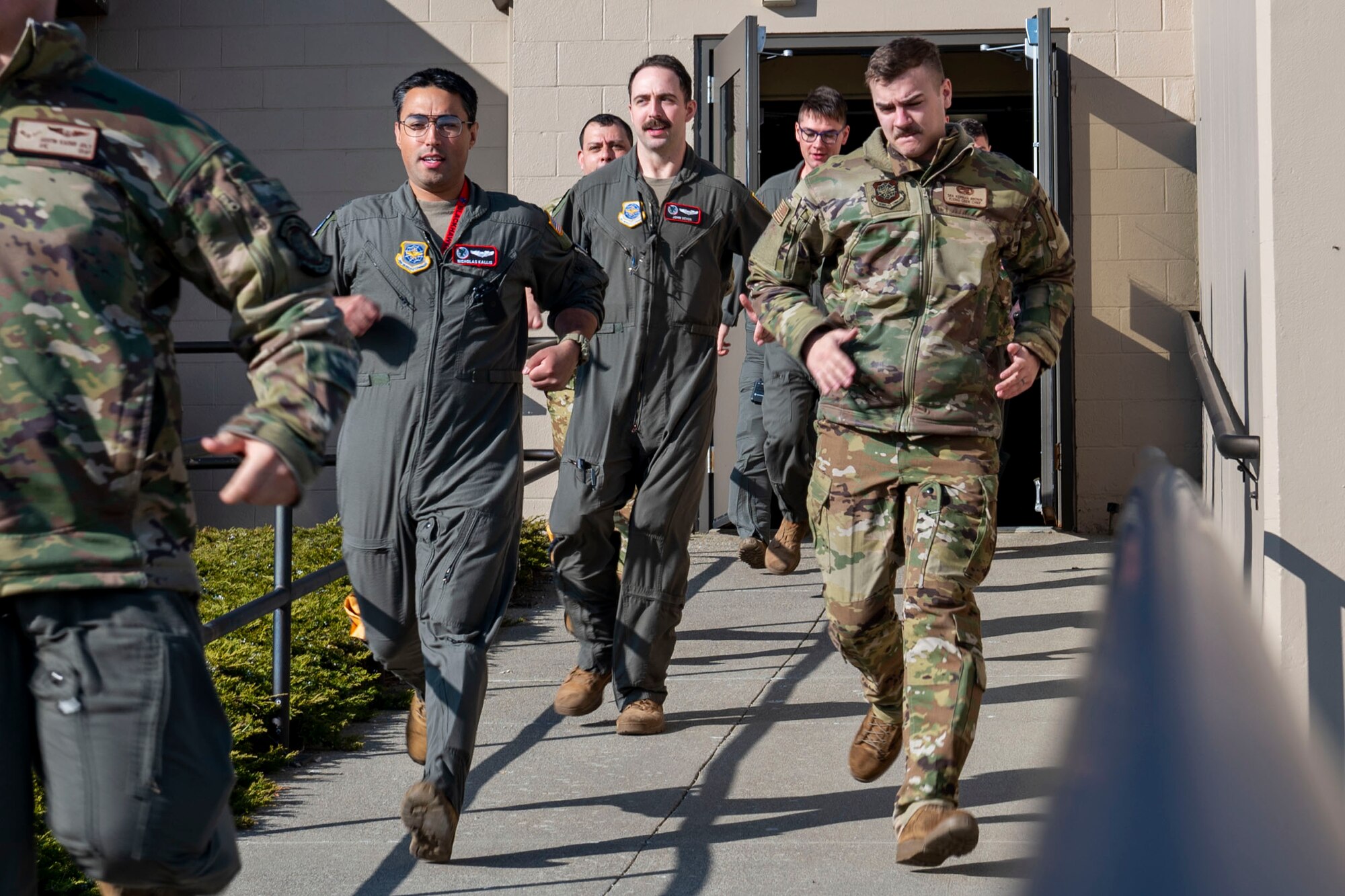 U.S. Air Force Airmen, assigned to Fairchild Air Force Base, perform a simulated alert response during exercise Global Thunder 23 at Fairchild Air Force Base, Washington, April 11, 2023. Global Thunder is an annual command and control exercise designed to train U.S. Strategic Command forces and assess joint operational readiness. (U.S. Air Force photo by Airman 1st Class Morgan Dailey)