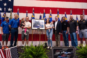 The Military Affairs Committee and 7th Bomb Wing leadership honor the Military Family of the Year at the World’s Largest BBQ hosted at the Abilene Convention Center in Abilene, Texas, April 15, 2023. The Abilene Military Affairs Committee hosted the 58th Annual World’s Largest BBQ honoring military personnel and their service. (U.S. Air Force photo by Airman 1st Class Alondra Cristobal Hernandez)