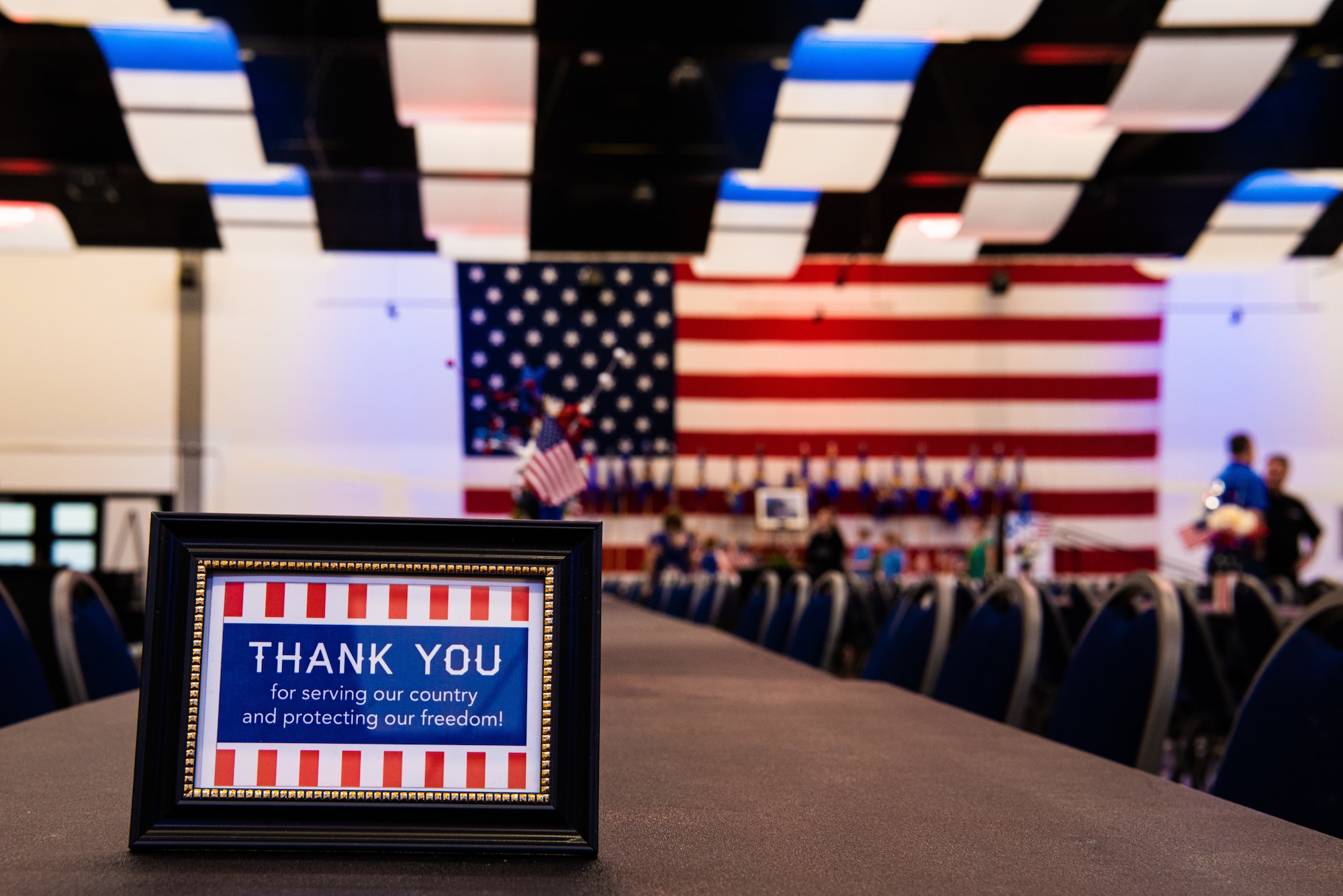 A ‘Thank you’ sign is displayed on a table at the World’s Largest BBQ at the Abilene Convention Center in Abilene, Texas, April 15, 2023. The Abilene Military Affairs Committee hosted the 58th Annual World’s Largest BBQ honoring military personnel and their service. (U.S. Air Force photo by Airman 1st Class Alondra Cristobal Hernandez)