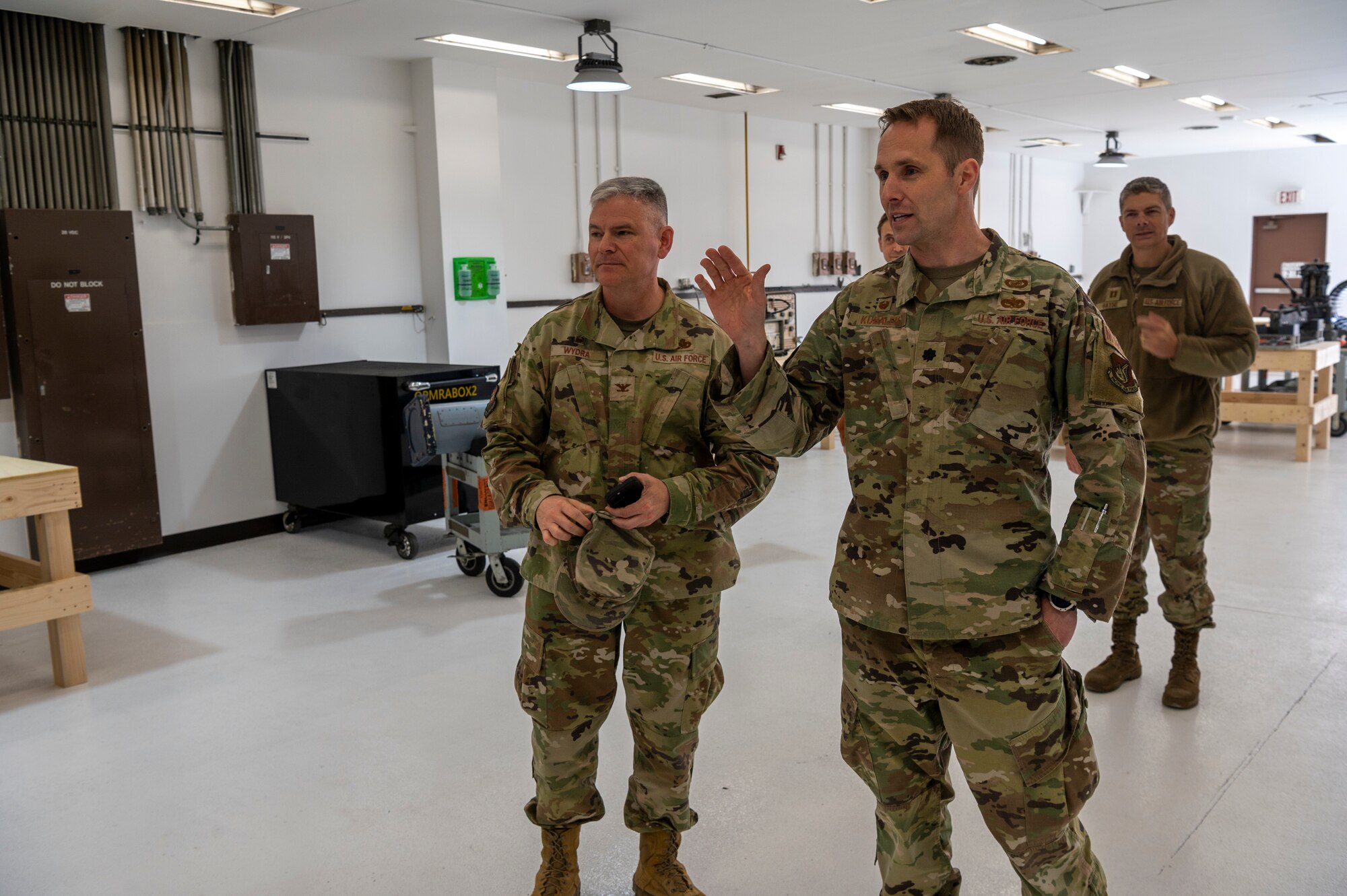 U.S. Air Force Lt. Col. Scott Kubalek, 51st Munitions Squadron commander, gives Col. Todd Wydra, 51st Maintenance Group commander, a tour of the newly renovated MUNS facility at Osan Air Base, Republic of Korea, April 12, 2023. Kubalek was able to save around $69,000 during the renovation by avoiding contracting costs and utilizing on base workshops and resources to get the job done. (U.S. Air Force Photo by Airman 1st Class Aaron Edwards)