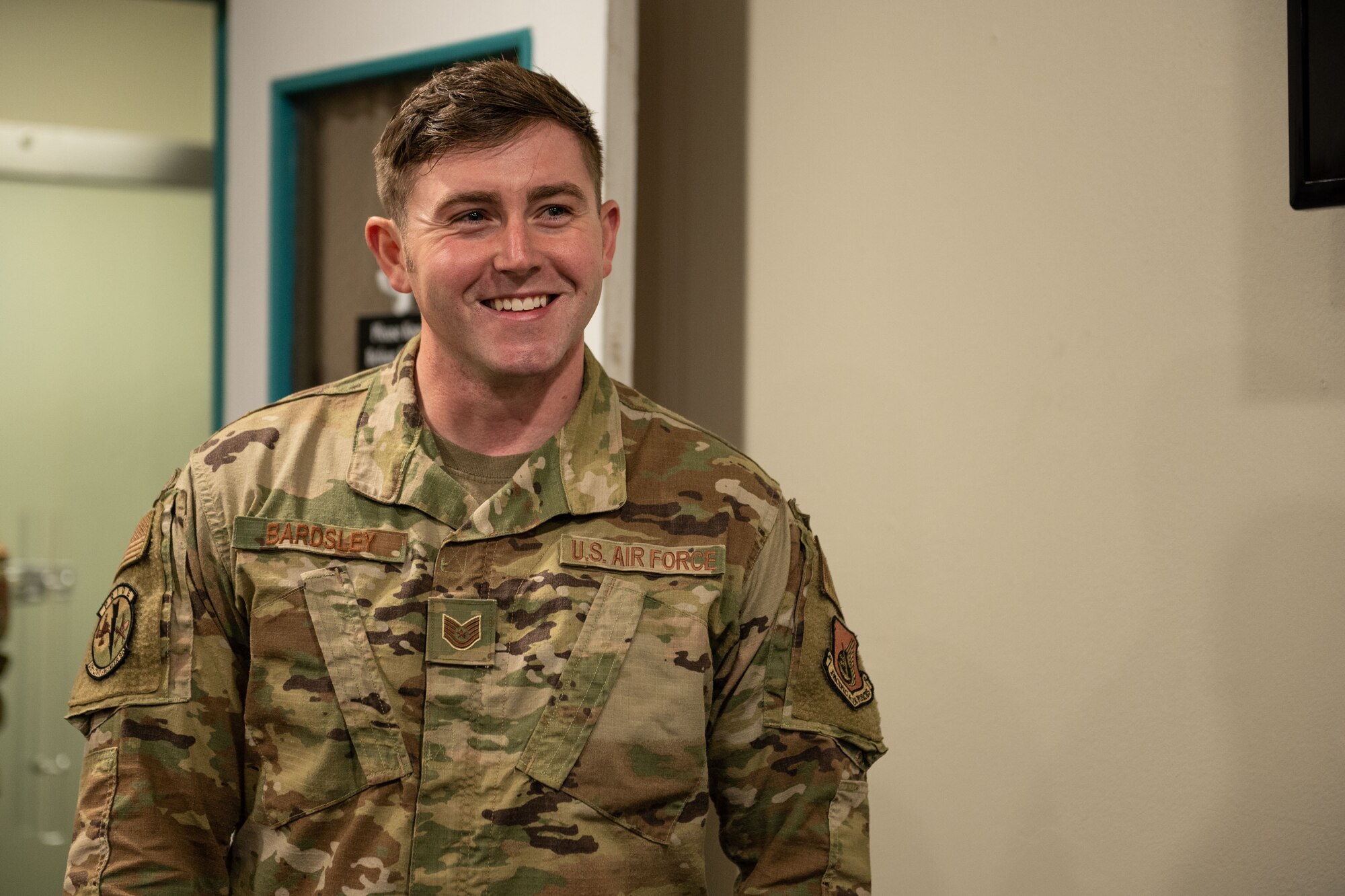 U.S. Air Force Tech. Sgt. Corey Bardsley, 51st Civil Engineer Squadron volunteer victim advocate, poses for a photo during Sexual Assault Awareness and Prevention Month at Osan Air Base, Republic of Korea, Apr. 12, 2023.
