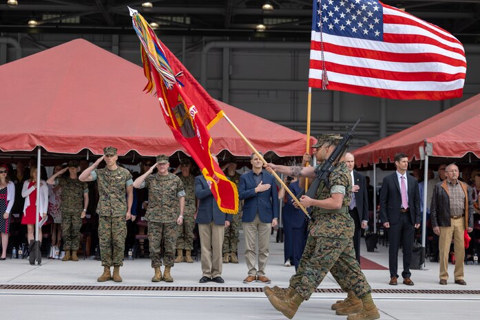 U.S. Marine Corps Lt. Col. Michael P. Fisher, commanding officer Marine Fighter Attack Squadron 311, Marine Aircraft Group 11, 3rd Marine Aircraft Wing, observes the pass and review with former VMFA 311 commanders during a reactivation ceremony at Marine Corps Air Station Miramar, California, April 14, 2023. The reactivation and redesignation of VMFA-311 marks the transition for the squadron to the F-35C Lightning II, which brings its unique capabilities to 3rd MAW as a long-range compliment to existing aviation assets. Formerly Marine Attack Squadron 311, the Tomcats have made their mark on Marine Corps aviation for decades, and now will continue their legacy.