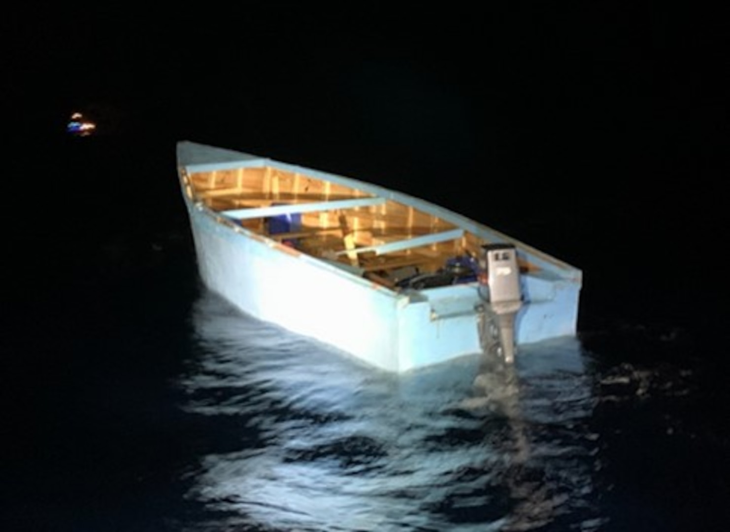 Coast Guard Cutter Kathleen Moore interdicts a 25-foot overloaded migrant voyage April 17, 2023. The cutter crew safely returned 40 migrants in this group, between April 18 and 19, 2023, to Dominican Republic Navy authorities in Punta Cana, Dominican Republic (U.S. Coast Guard photo