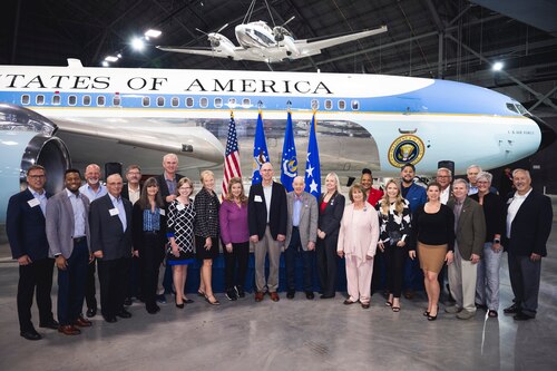 group photo in front of Air Force One at museum