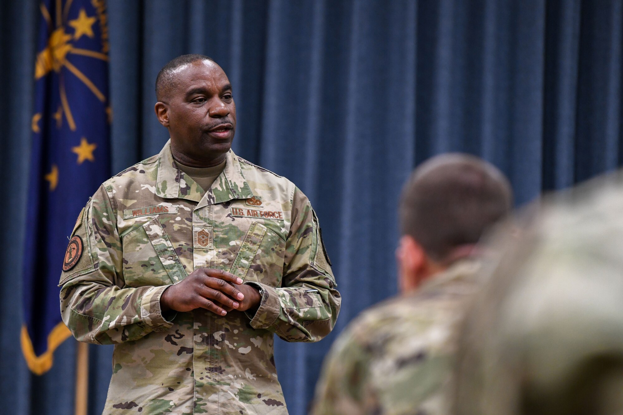 Air Force Chief Master Sgt. Maurice L. Williams, the Air National Guard command chief, addresses the Junior Enlisted Council at Hulman Field Air National Guard Base, Ind., April 15, 2023.