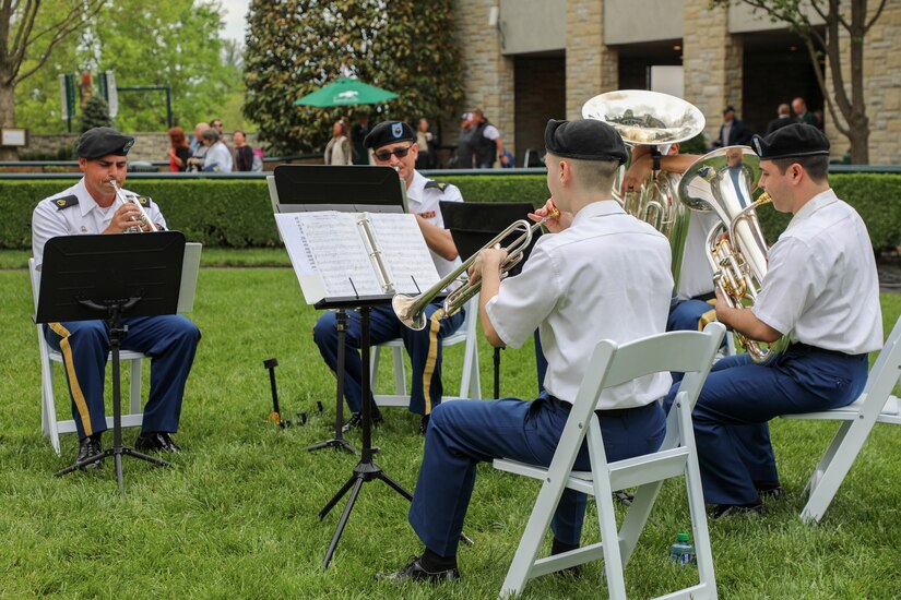 The 202nd Army Band helped kick off the spring meet at Keeneland Racetrack as they opened their doors to all military members and their families to enjoy a day of fun, food and horse racing.