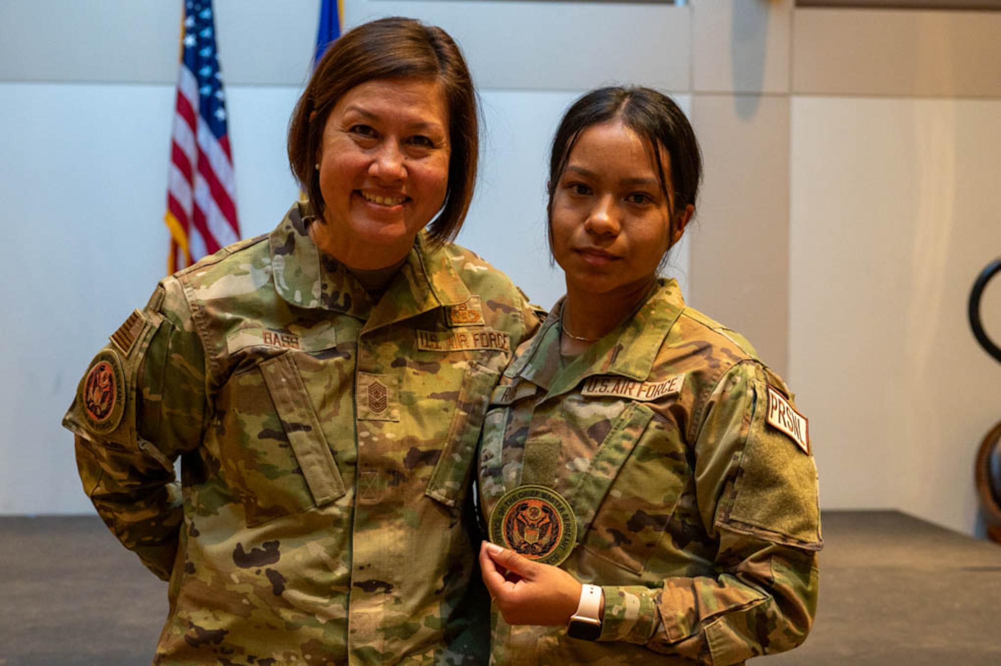 Two women pose for a photo