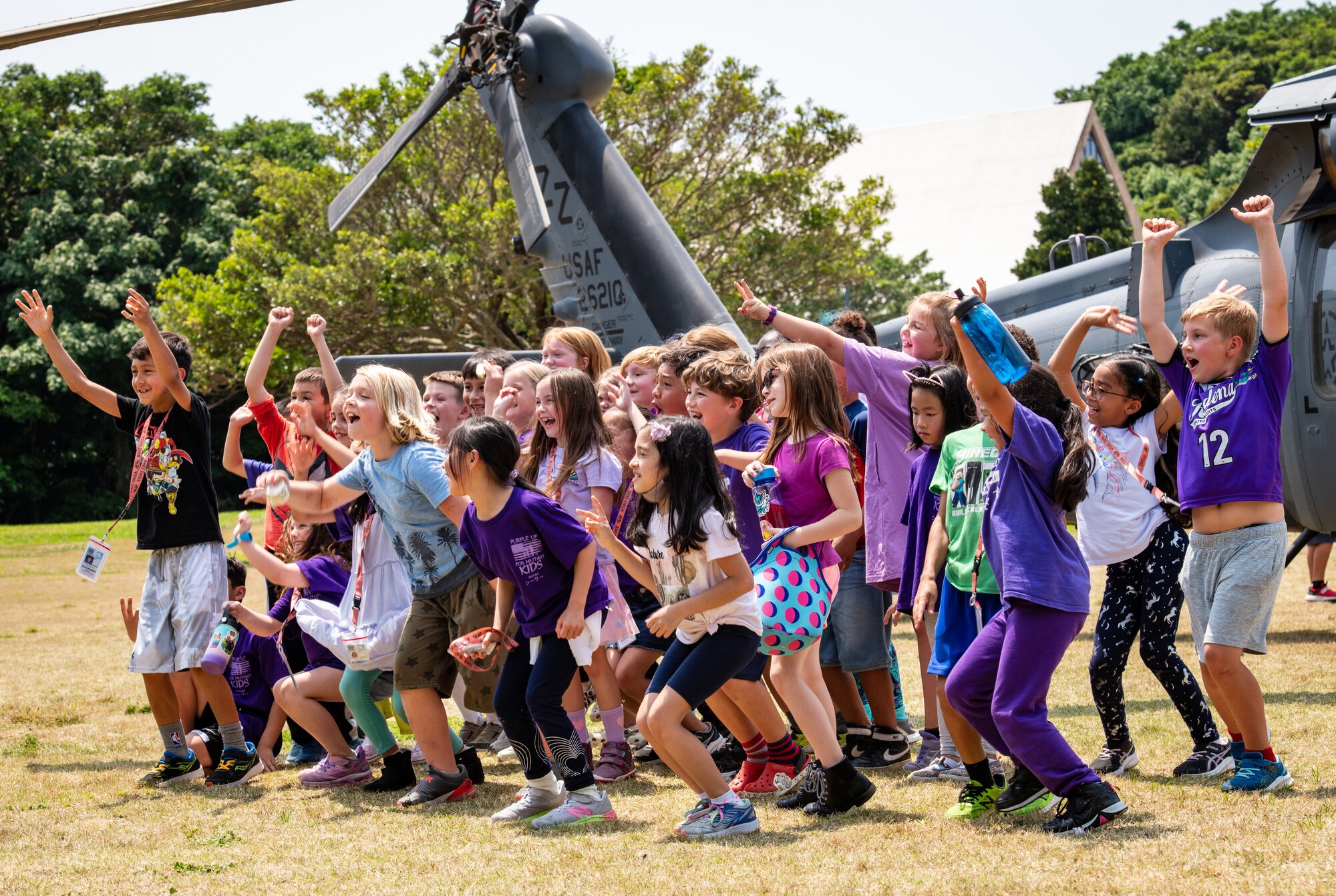 A group of kids celebrate.