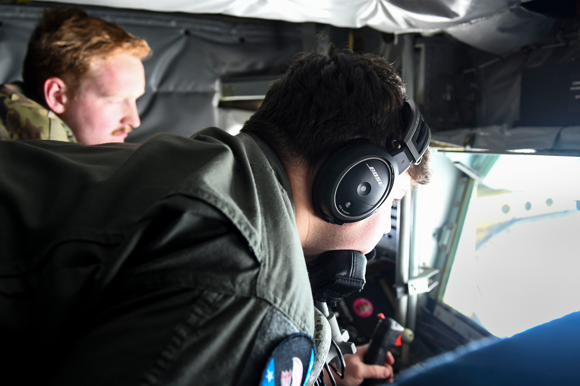 U.S. Air Force Airman First Class Austin Kaiser Joly, 92nd Air Refueling Squadron in-flight refueling specialists, prepares to fuel a B-52 Stratofortress, during exercise Global Thunder 23, April 16, 2023. The 92nd Air Refueling Wing, along with mission partners, participate in Global Thunder, United States Strategic Command’s annual command control training exercise that enhances readiness (U.S. Air Force Photo by Capt. Teri L. Bunce)