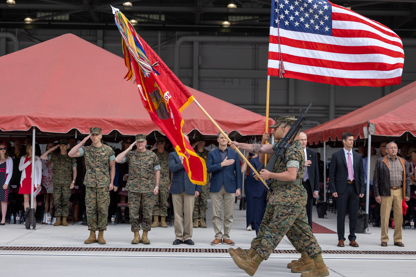 U.S. Marine Corps Lt. Col. Michael P. Fisher, commanding officer Marine Fighter Attack Squadron 311, Marine Aircraft Group 11, 3rd Marine Aircraft Wing, observes the pass and review with former VMFA 311 commanders during a reactivation ceremony at Marine Corps Air Station Miramar, California, April 14, 2023. The reactivation and redesignation of VMFA-311 marks the transition for the squadron to the F-35C Lightning II, which brings its unique capabilities to 3rd MAW as a long-range compliment to existing aviation assets. Formerly Marine Attack Squadron 311, the Tomcats have made their mark on Marine Corps aviation for decades, and now will continue their legacy.