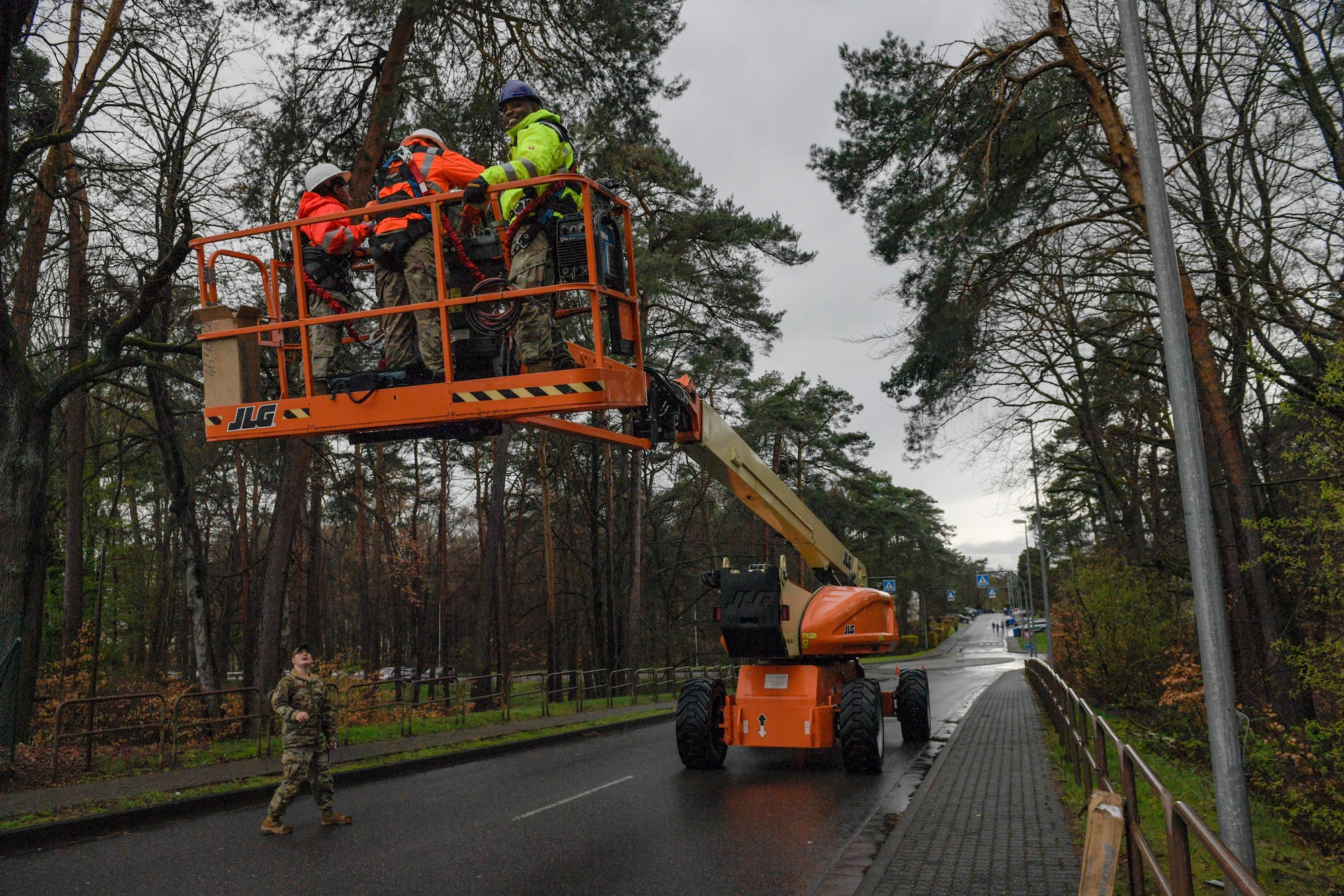 U.S. Air Force Brig. Gen. Otis C. Jones, 86th Airlift Wing commander, joins Airmen from the 786th Civil Engineer Squadron as they upgrade a street light at Ramstein Air Base, Germany, April 12, 2023. The 86th AW command team gained a first-hand understanding of how the 786th CES ensures Team Ramstein’s no-fail mission supporting allies and partner nations, and enabling the Global Gateway.