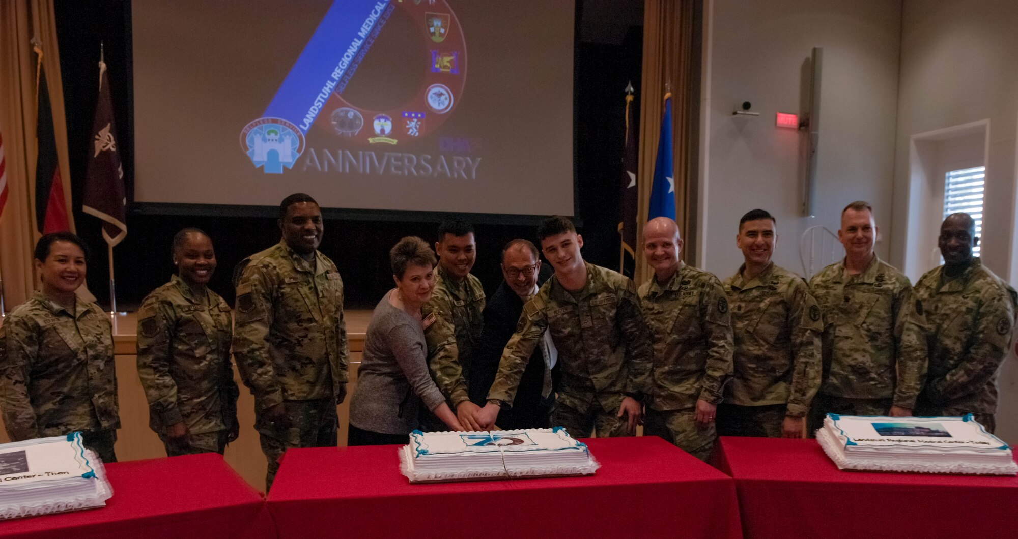 Leadership from Landstuhl Regional Medical Center and Ramstein Air Base, Germany, celebrate their 30-year partnership during a cake cutting ceremony at LMRC, April 14, 2023. LRMC opened its doors 70 years ago and began their partnership with the 86 Medical Squadron in 1993.