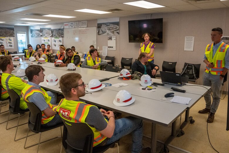Engineering students from the University of Louisville receive an overview brief of the project from Terry Durham, area engineer for the Louisville VA Medical Center project, during their visit to the site April 13, 2023.