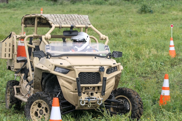 Alex Guzman, a member of the fence maintenance crew with the LA District’s Operations and Maintenance Branch, negotiates a series of maneuvers to demonstrate his proficiency with a utility terrain vehicle March 23 during training at the Whittier Narrows Dam area of operations in Pico Rivera, California.