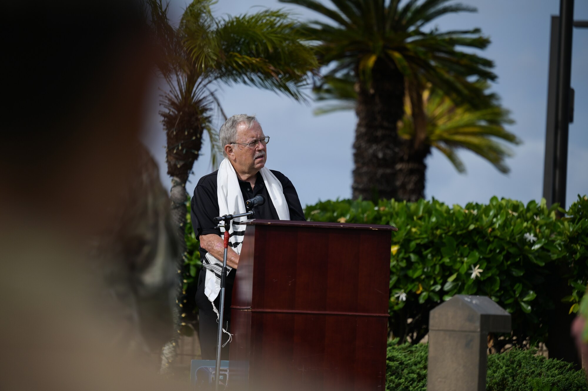 Daniel Bender, a leader at the Lay Aloha Jewish Chapel, speaks during a Holocaust Remembrance Ceremony at the Missing Man Monument on Joint Base Pearl Harbor-Hickam, Hawaii, April 18, 2023. The ceremony was held in commemoration of Holocaust Remembrance Week. (U.S. Air Force photo by Staff Sgt. Alan Ricker)