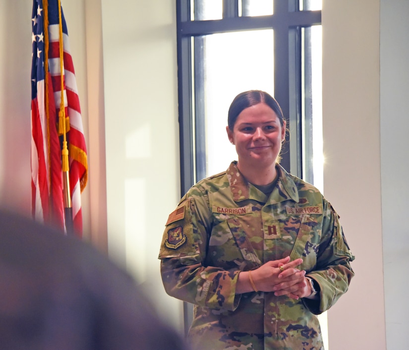 U.S. Air Force Capt. Leah Garrison, Sexual Assault Prevention and Response deputy sexual assault response coordinator, speaks at the Sexual Assault Awareness and Prevention Month proclamation signing on Joint Base McGuire-Dix-Lakehurst, N.J., Apr. 6, 2023. The SAAPM proclamation signing is an event that Joint Base MDL leadership and members of the joint base community come together to promote the prevention of sexual violence and provide protection and support to the victims and survivors of interpersonal violence around the joint base. April is Sexual Assault Awareness and Prevention Month. Joint Base MDL observes this month by raising awareness to prevent sexual assault and harassment and to provide resources and victim support to educate the public. These efforts contribute to a safe and secure joint base community. (U.S. Air Force photo by Daniel Barney)