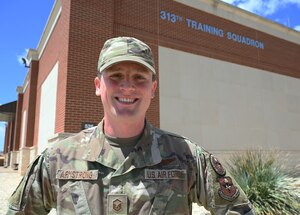 U.S. Air Force Master Sgt. Chris Armstrong, 313th Training Squadron Flight Chief, smiles at Goodfellow Air Force Base, Texas, April 10, 2023. Armstrong has been enlisted in the Air Force for 18 years. (U.S. Air Force photo by Airman 1st Class Madison Collier)