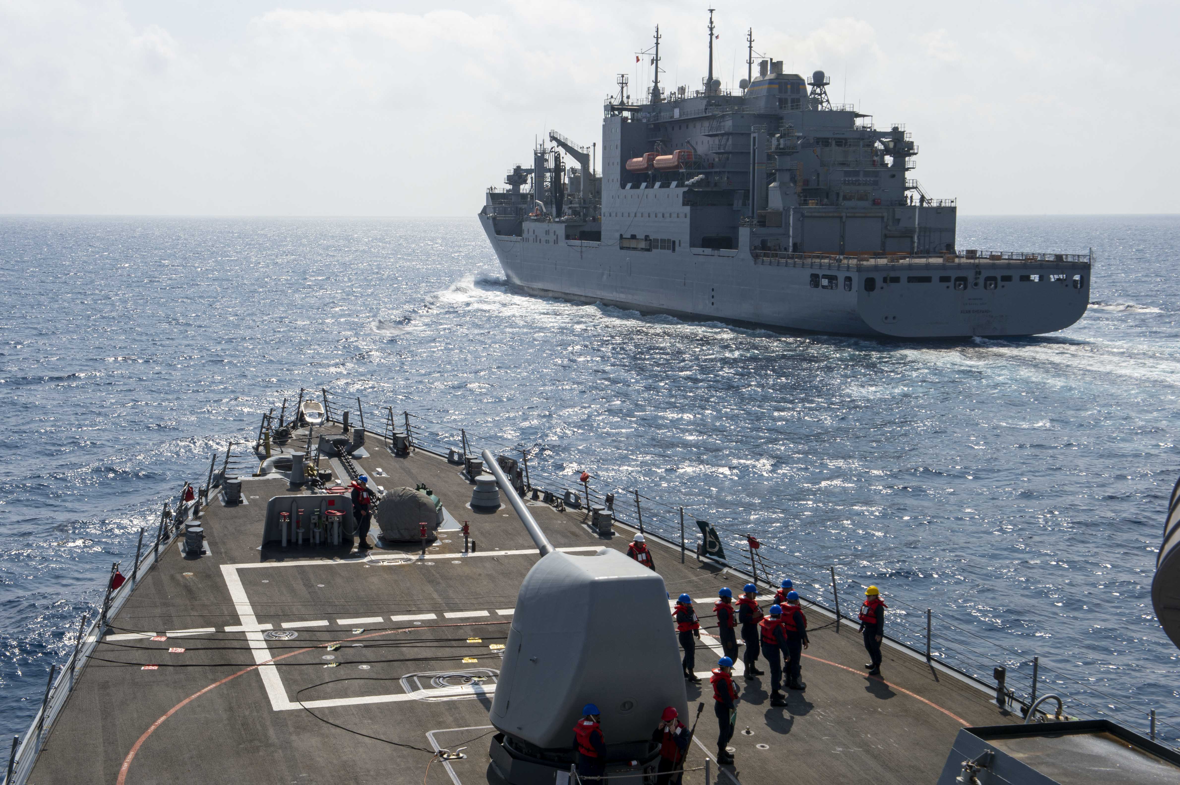The guided-missile destroyer USS Paul Hamilton (DDG 60) approaches the replenishment oiler USNS Alan Shepard during a replenishment-at-sea, April 16, 2023 in the Arabian Sea.