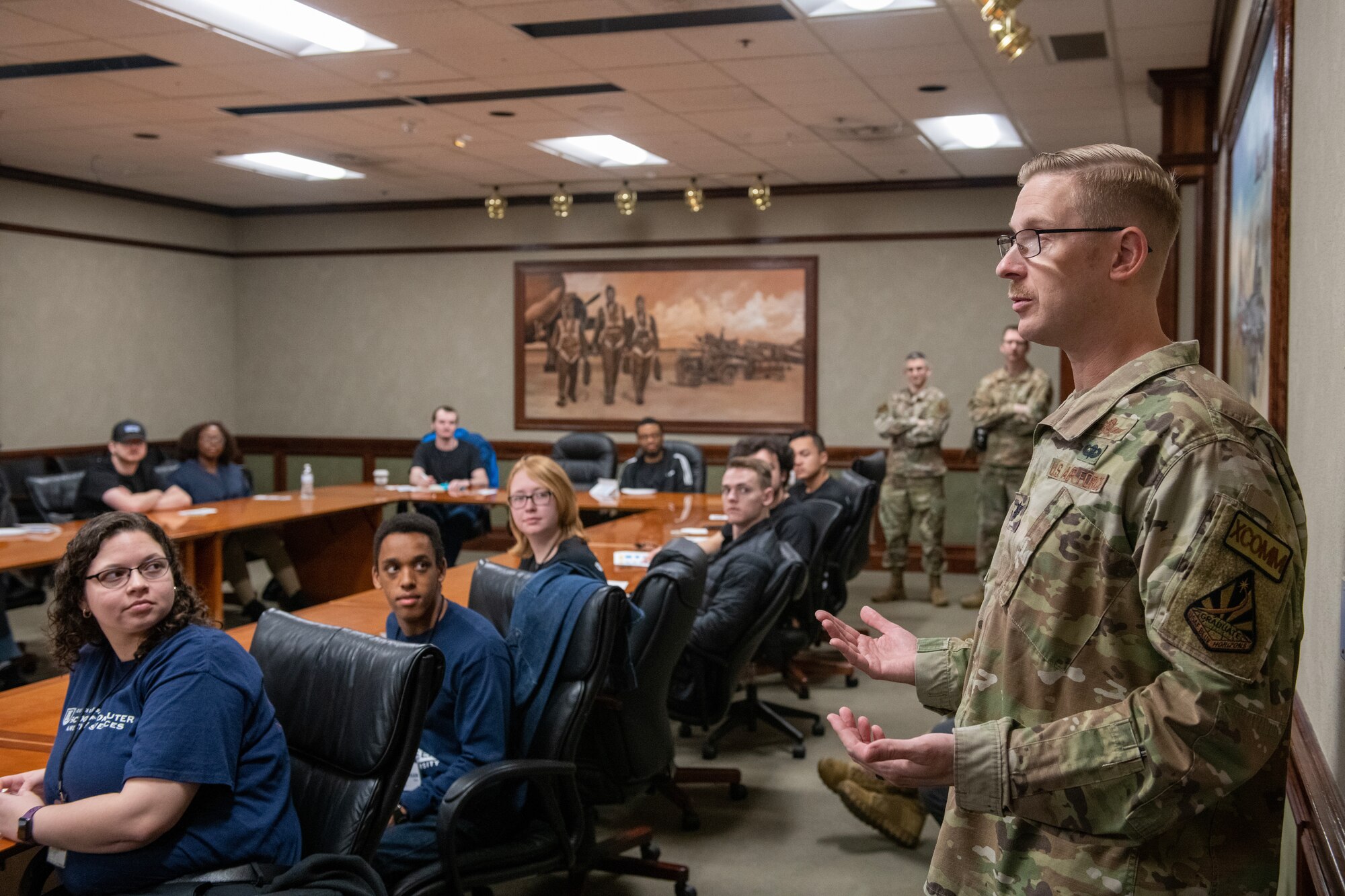 U.S. Air Force Lt. Col. Nicholas Kuc, 333rd Training Squadron commander, welcomes Mississippi State University students during a tour of the 333rd TRS at Keesler Air Force Base, Mississippi, March 16, 2023.