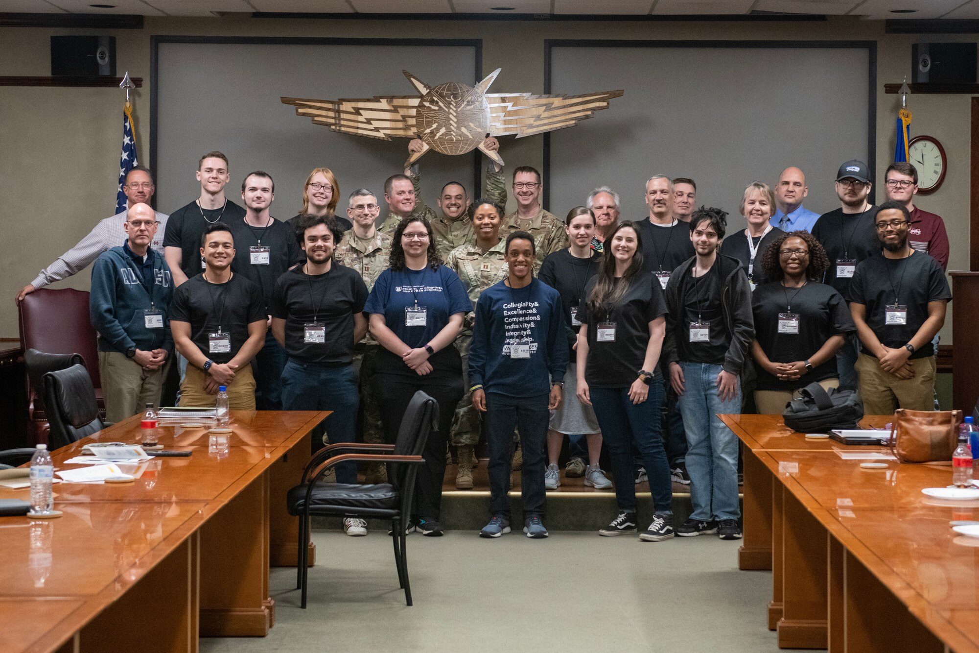 Mississippi State University students and Keesler personnel pose for a group photo at Keesler Air Force Base, Mississippi, March 16, 2023.