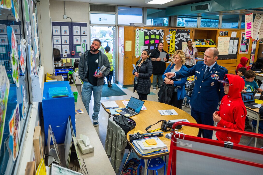 U.S. Space Force Maj. Gen. Douglas A. Schiess, Combined Force Space Component Command commander, and Mrs. Debbie Schiess, engage with a student at Valley Elementary School in Yucaipa, California, April 14, 2023. Schiess, a previous student of Valley and resident of Yucaipa, was invited back to his old elementary school for ‘Leadership Day’ where he gave a speech, visited classrooms and discussed Space Force-related topics with faculty members. This visit is part of the GO Inspire Program, designed for General Officers to inform, influence and inspire young Americans for military service and give the opportunity for every youth to connect with someone they can identify with whether that is based on race, gender or where they grew up. (U.S. Space Force photo by Tech. Sgt. Luke Kitterman)